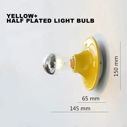 Yellow half-plated decorbites led macaron wall lamp with reflective silver globe and clear filament for bedroom lighting