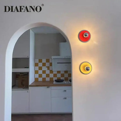 Red and yellow circular wall lamp with chrome centers by diafano decorbites led macaron for colorful bedroom lighting