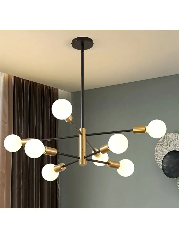 Decorbites™ led magic bean chandelier with brass rod and black metal arms holding frosted globes for indoor use