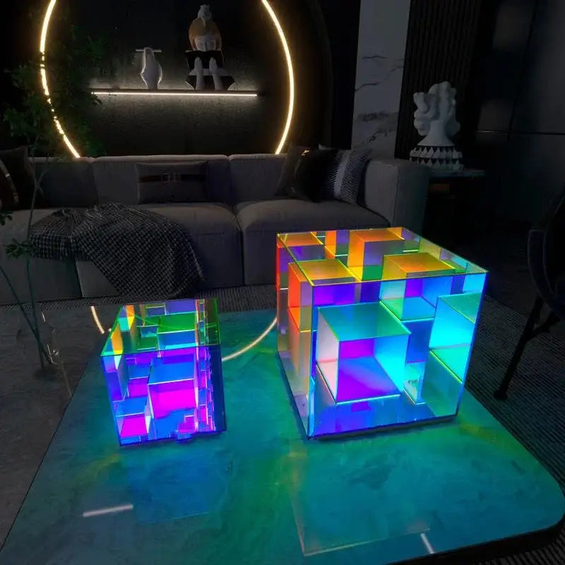 Two illuminated translucent cube-shaped led magic cube desk lamps with vibrant rainbow lighting by DecorBites led magic