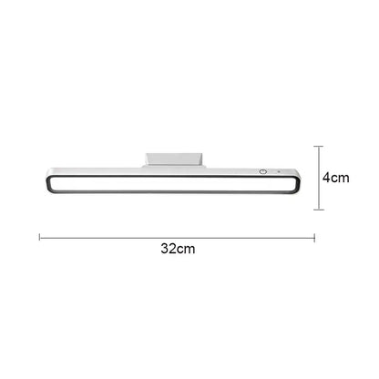 A sleek white 32cm decorbites led magnetic strip light with black trim for magnetic desk lamp and cabinet use