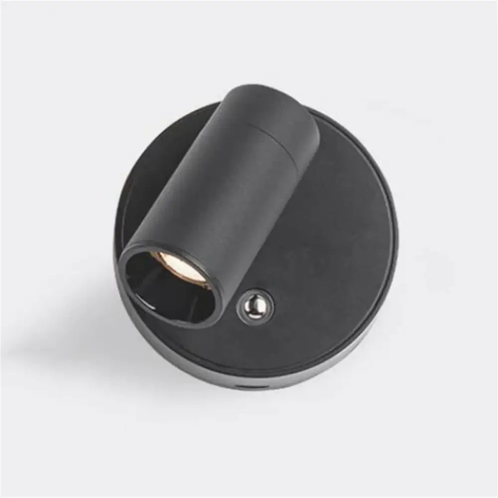 Black cylindrical wall light with matte finish and adjustable head decorbites led magnetic bedside lamp