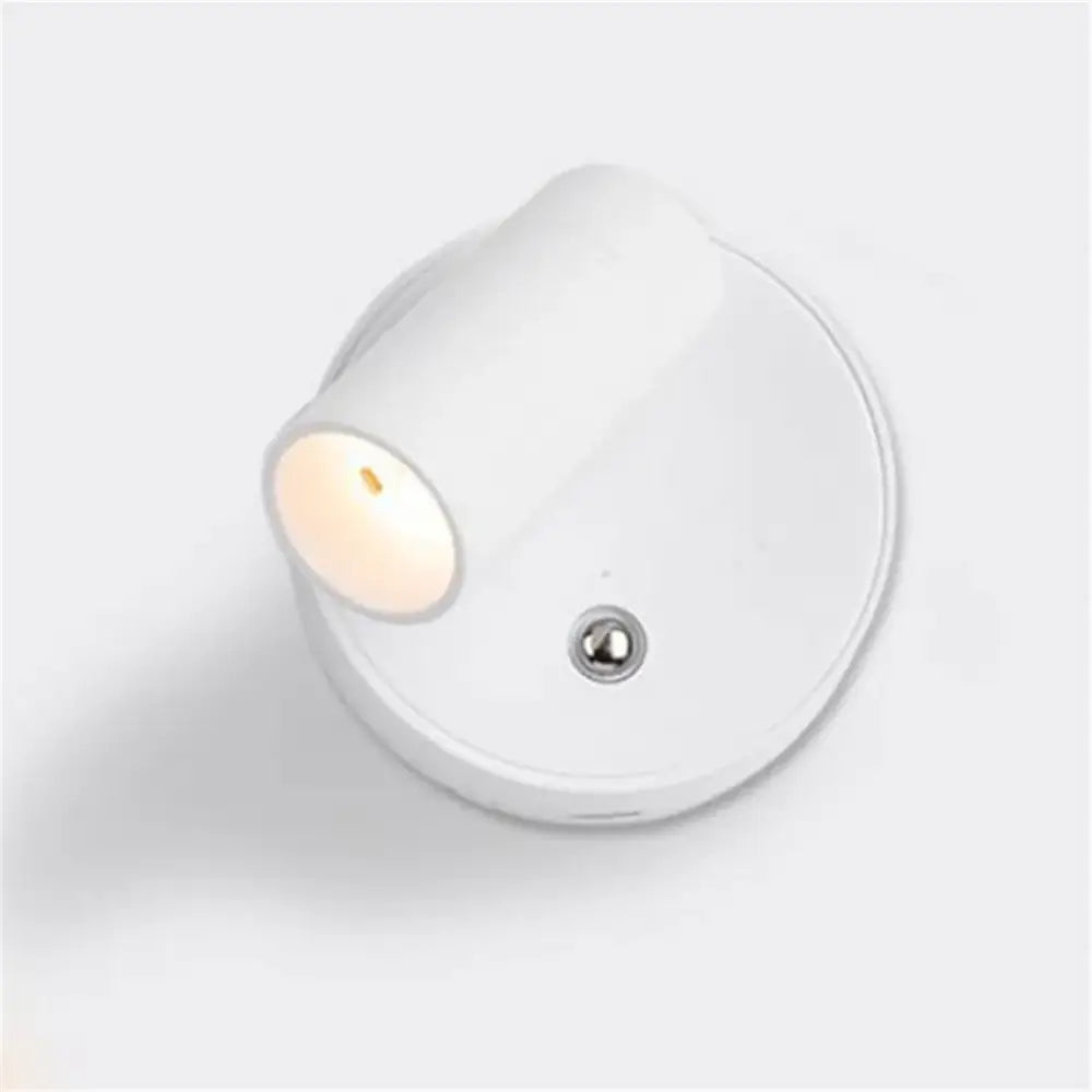 White DecorBites led magnetic wall light with sleek rounded design and soft glow for bedside reading