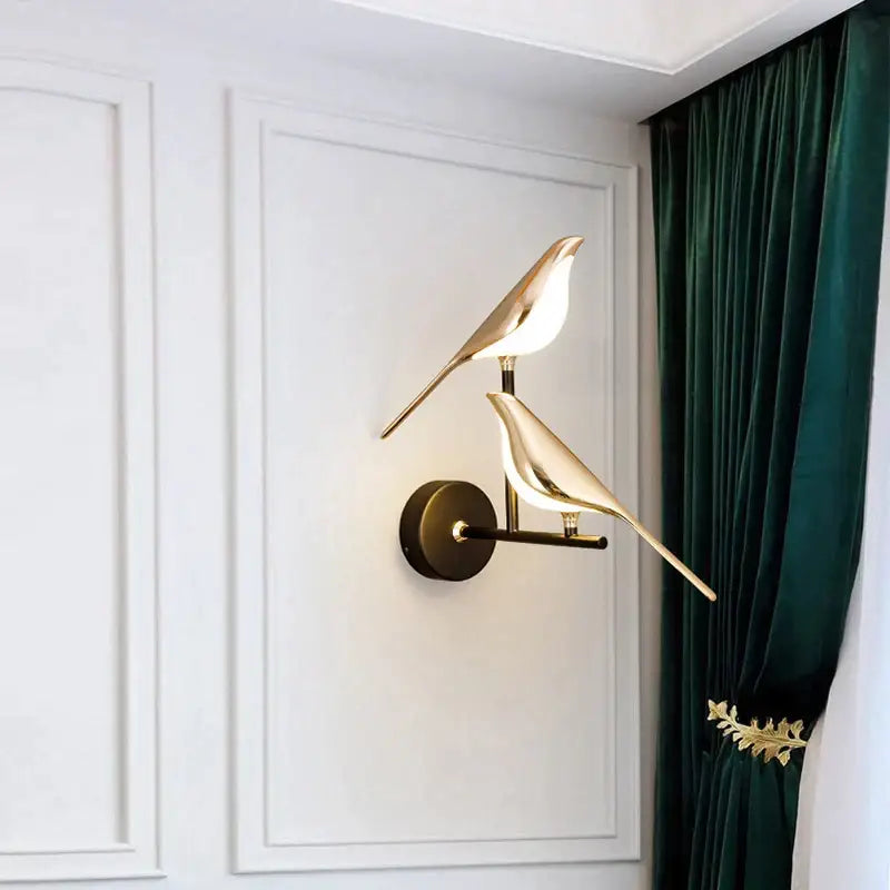Gold-toned decorbites led magpie bird pendant light with sleek minimalist design and polished metal finish for modern decor