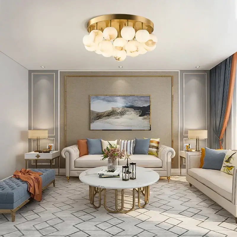 Gold-toned DecorBites LED marble balls chandelier with multiple spherical glass bulbs for dining room lighting