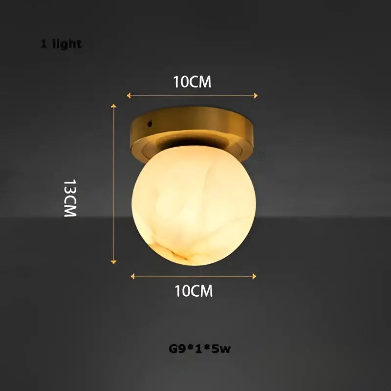 Gold-toned decorbites led marble balls chandelier with frosted glass globe and brass base for dining room lighting