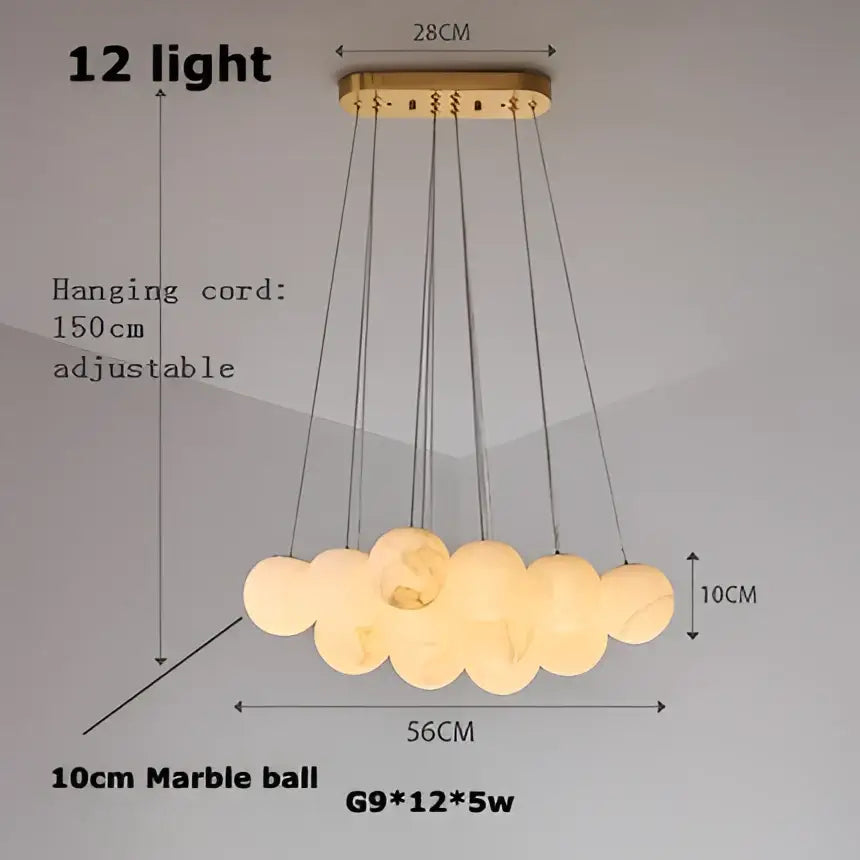 A decorbites led marble balls chandelier with 12 warm-glowing marble balls and gold-toned fixture for dining room