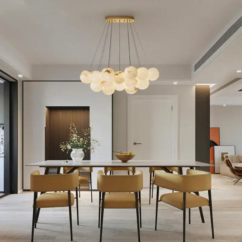 Modern decorbites led marble balls chandelier with frosted glass orbs and gold-toned frame for dining room lighting