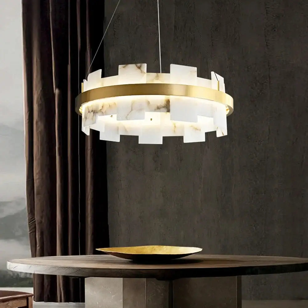 A modern decorbites led marble chandelier with gold metal frame and white marble panels for living room or restaurant lighting