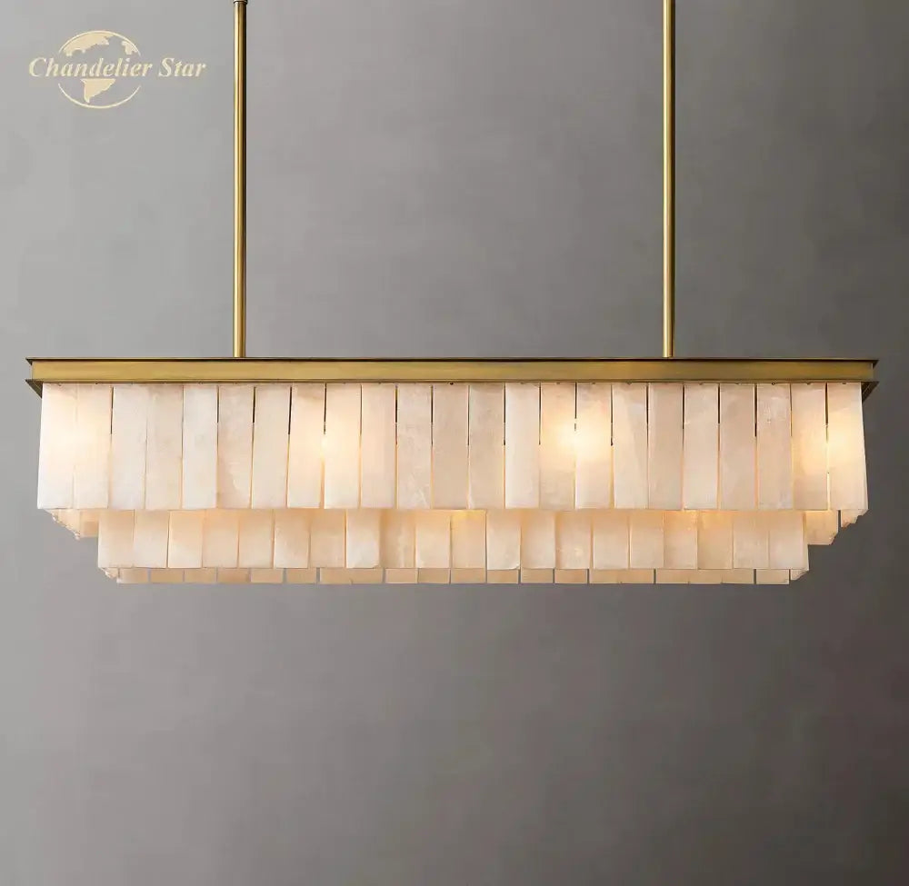 Gold-toned decorbites led marble rectangular chandelier with two tiers of translucent marble glace calcite slabs for kitchen island