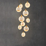 Modern chandelier with translucent white opal discs and gold-toned hardware decorbites led marble gold chandelier