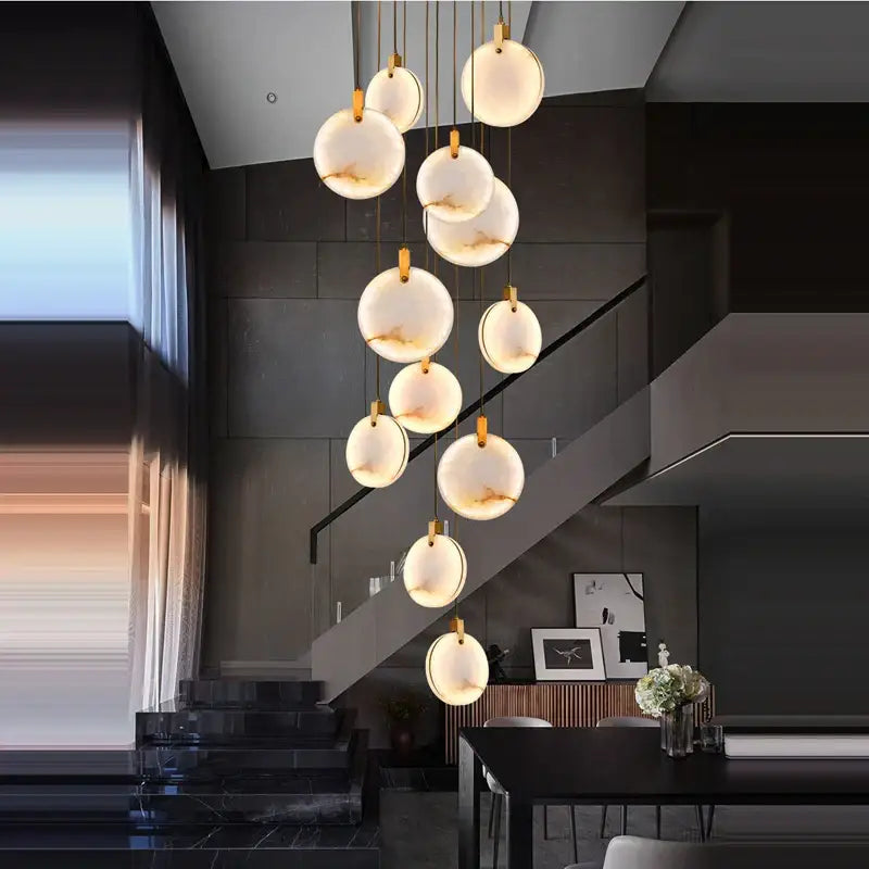 Decorbites led marble gold chandelier featuring spherical translucent glass orbs with gold veining for living room lighting