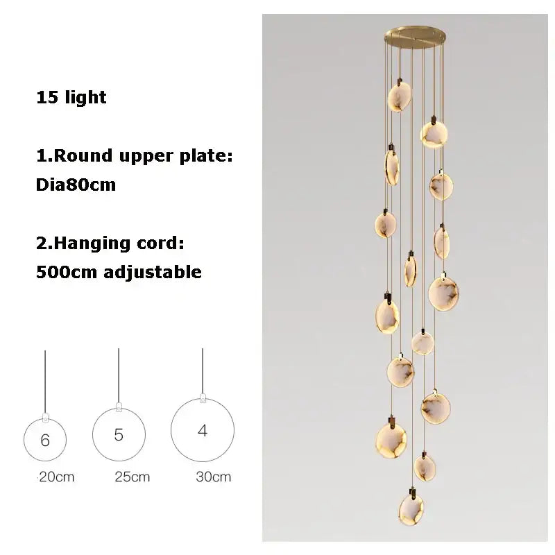 Modern pendant marble gold chandelier with 15 warm LED glass orbs suspended from gold circular plate decorbites led marble