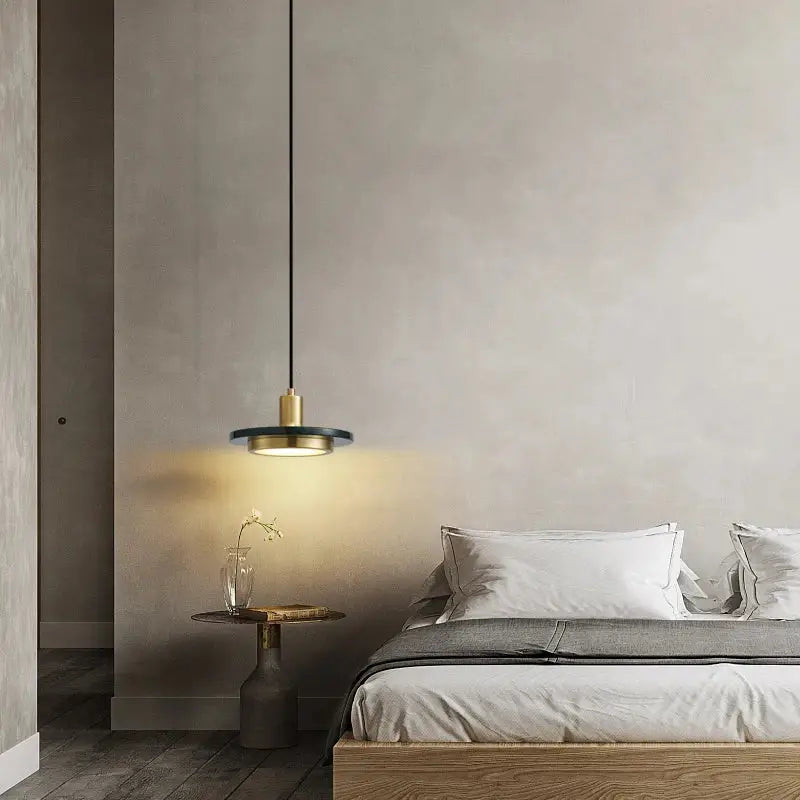 Minimalist decorbites led marble pendant lamp with sleek black and gold finish and warm circular shade illumination