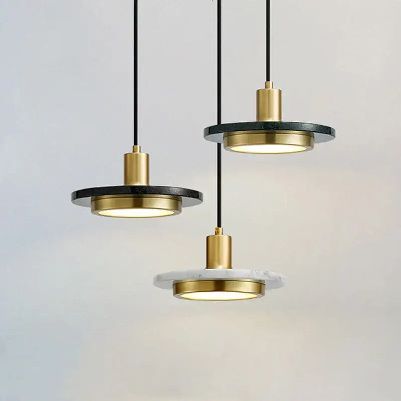 Modern DecorBites LED marble pendant light with gold-toned metal fixtures and black and white circular discs for luxury decor