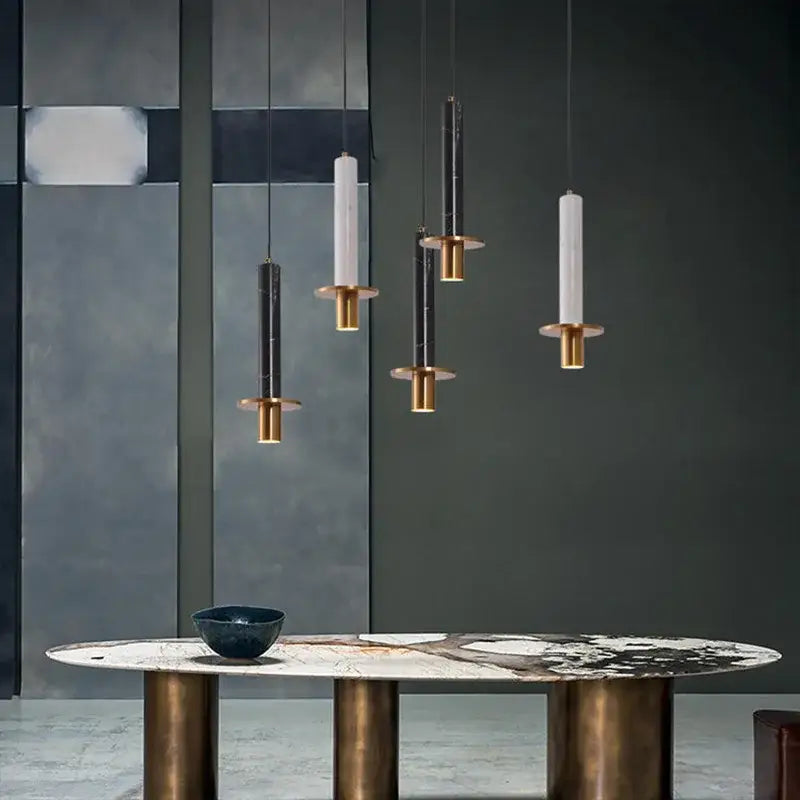 Modern cylindrical pendant light with matte black and white marble shafts brass bases by decorbites led marble for dining room