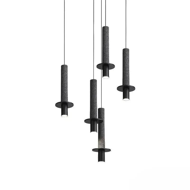 Modern black cylindrical pendant light with textured surface and circular base from decorbites led marble stone series