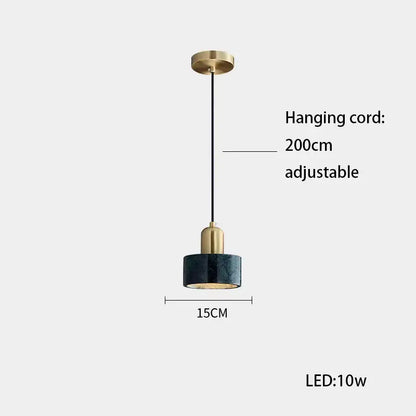 A sleek decorbites led marble pendant light with brass metal top and dark teal ceramic shade for dining room use