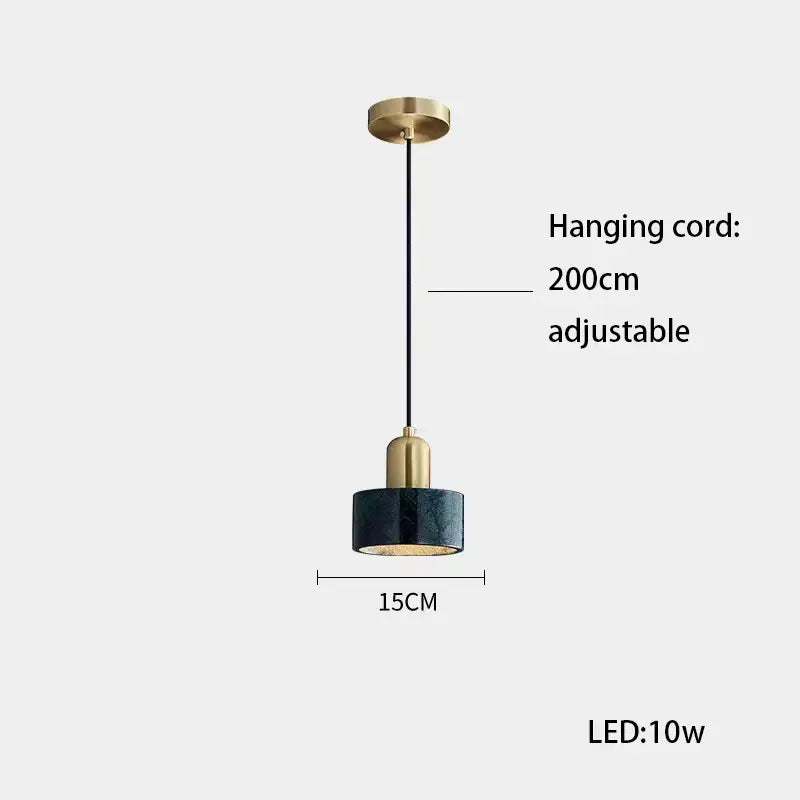 A sleek decorbites led marble pendant light with brass metal top and dark teal ceramic shade for dining room use