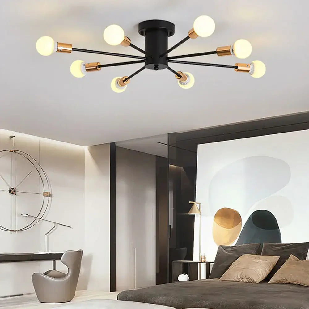 Black and brass decorbites led metal chandelier with eight glowing spherical bulbs for stylish ceiling light decor