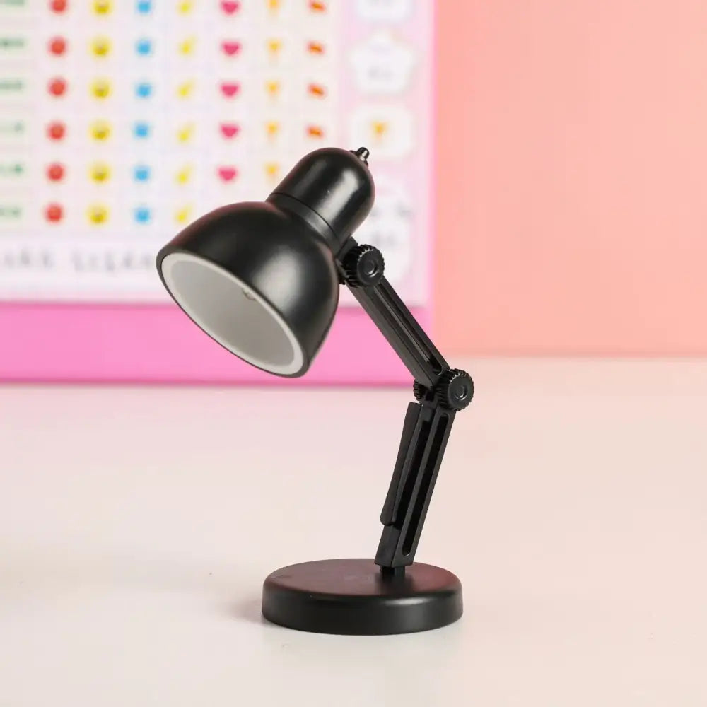 Black decorbites led mini desk lamp with adjustable matte finish arm, foldable design, and magnetic base for study use