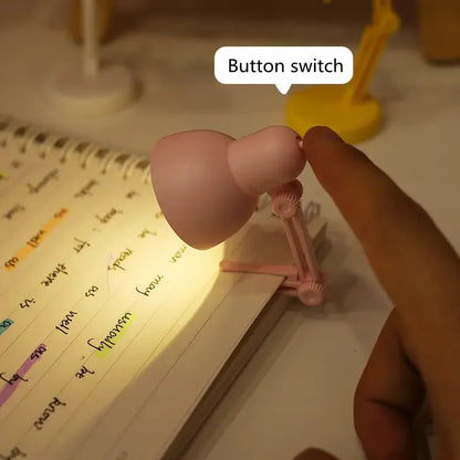 Pink plastic decorbites led mini desk lamp with adjustable arm, button switch, and foldable design for bedroom night light