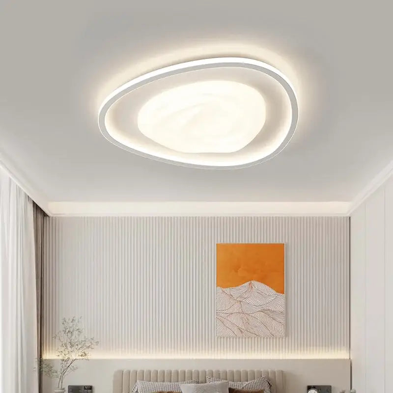 Modern white led minimalism chandelier by decorbites with oval sleek design and soft glowing indoor lighting ambiance