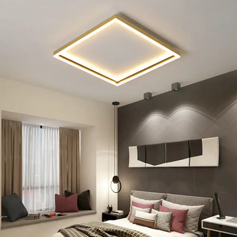 Square ceiling light with golden finish and warm white led illumination from decorbites led minimalist chandelier series