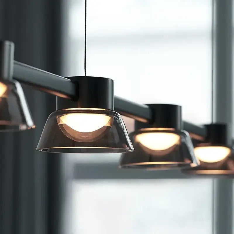 Modern black pendant lights with translucent amber glass shades for kitchen island by DecorBites led minimalist chandelier