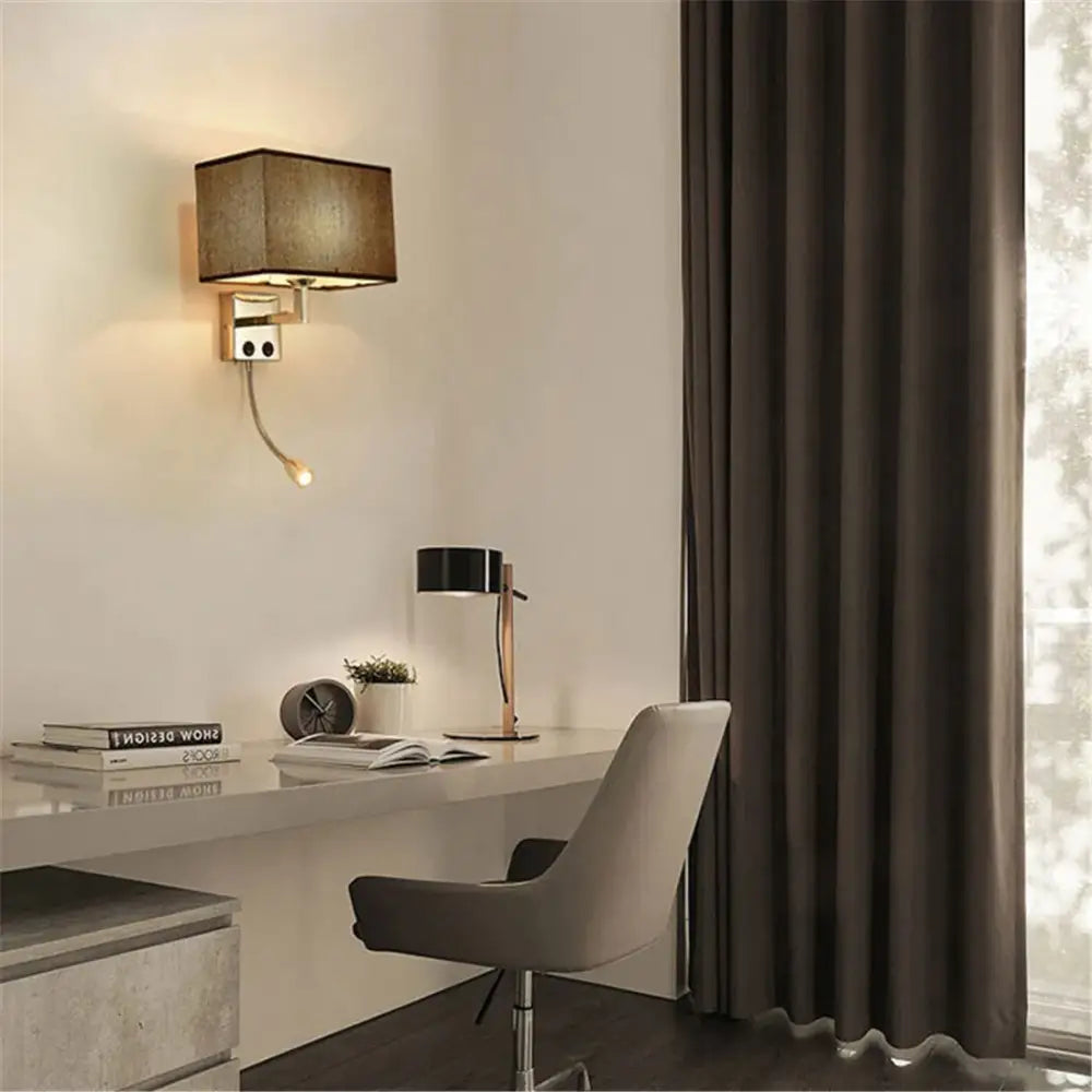 A decorbites led minimalist wall lamp with rectangular brown fabric texture shade and metallic base for living room use
