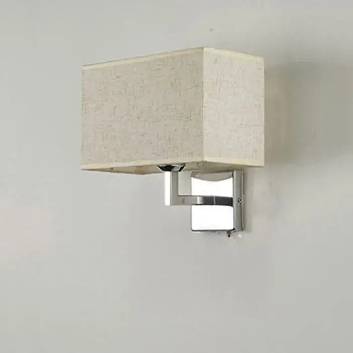 Modern rectangular wall lamp with textured beige fabric shade and polished chrome base by decorbites led minimalist wall lamps