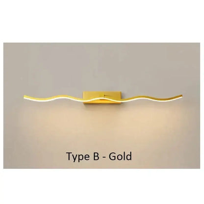 Gold-finished decorbites led mirror bathroom wall sconce with sleek wavy design and warm illumination