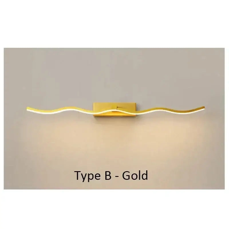 Gold-finished decorbites led mirror bathroom wall sconce with sleek wavy design and warm illumination