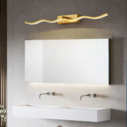 Gold-toned wave-shaped led wall sconce with sleek modern design for decorbites led mirror bathroom use