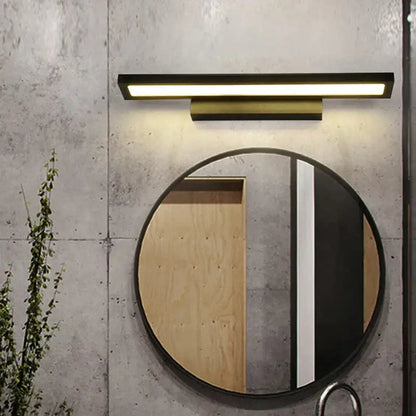 Modern black rectangular decorbites led mirror wall lamp with warm glow mounted above round bathroom mirror