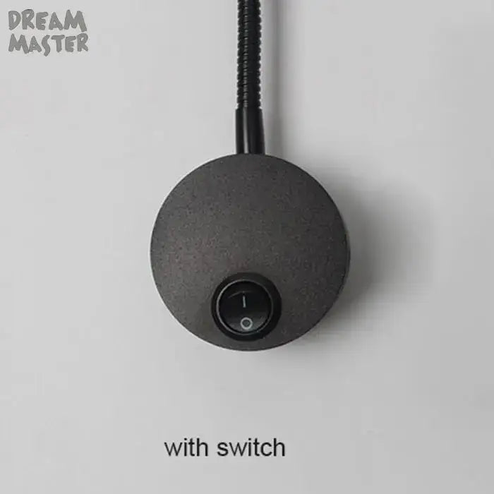 Black circular DecorBites LED mirror light bedside lamp with matte finish and integrated on/off switch for modern wall lighting