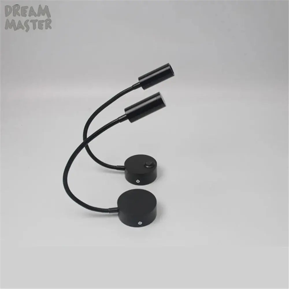 Black dual-head flexible desk lamp with curved gooseneck arms and circular base for decorbites led mirror bedside use