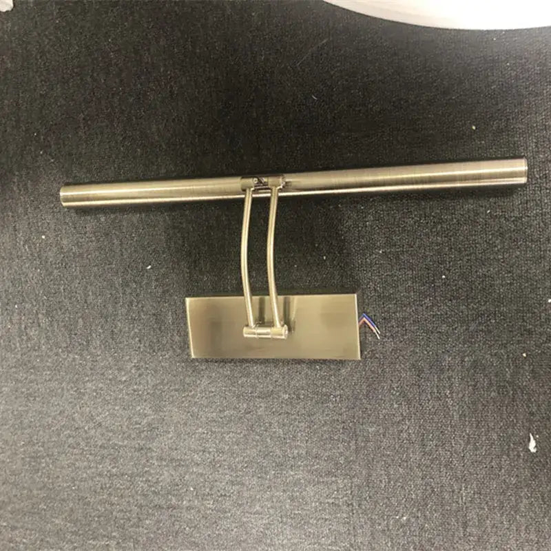 Brushed nickel finish decorbites led mirror light with sleek rectangular base and curved arm for bathroom wall decor