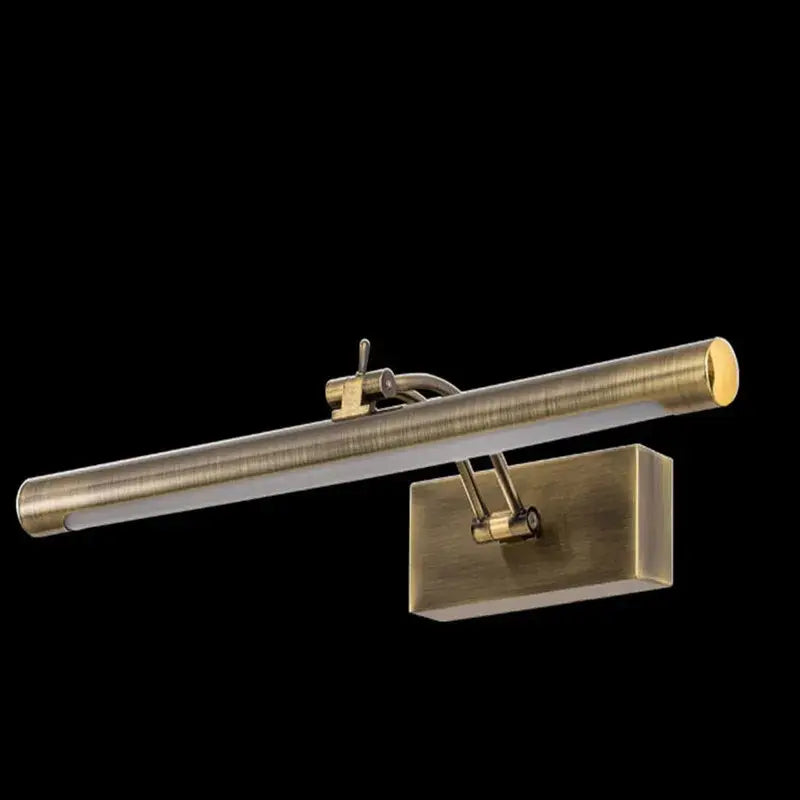 Antique brass-finished decorbites led mirror light with a sleek cylindrical bar and adjustable arm for bathroom wall decor