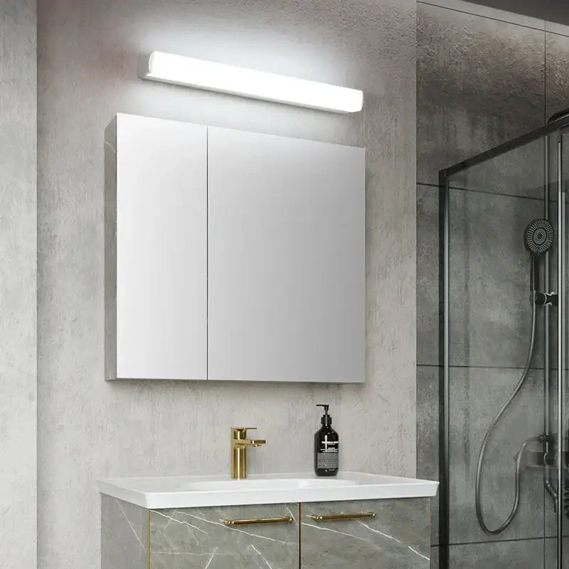 White mirrored medicine cabinet with gold hardware and built-in led mirror light by decorbites wall sconces for indoor use