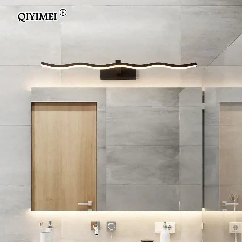 Modern black wave-shaped decorbites led mirror light fixture with sleek metallic finish for indoor bathroom use