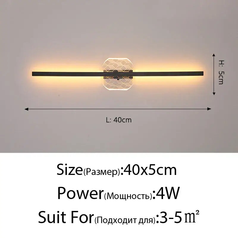Modern black and clear glass decorbites led mirror wall lamp with geometric honeycomb panel emitting warm light