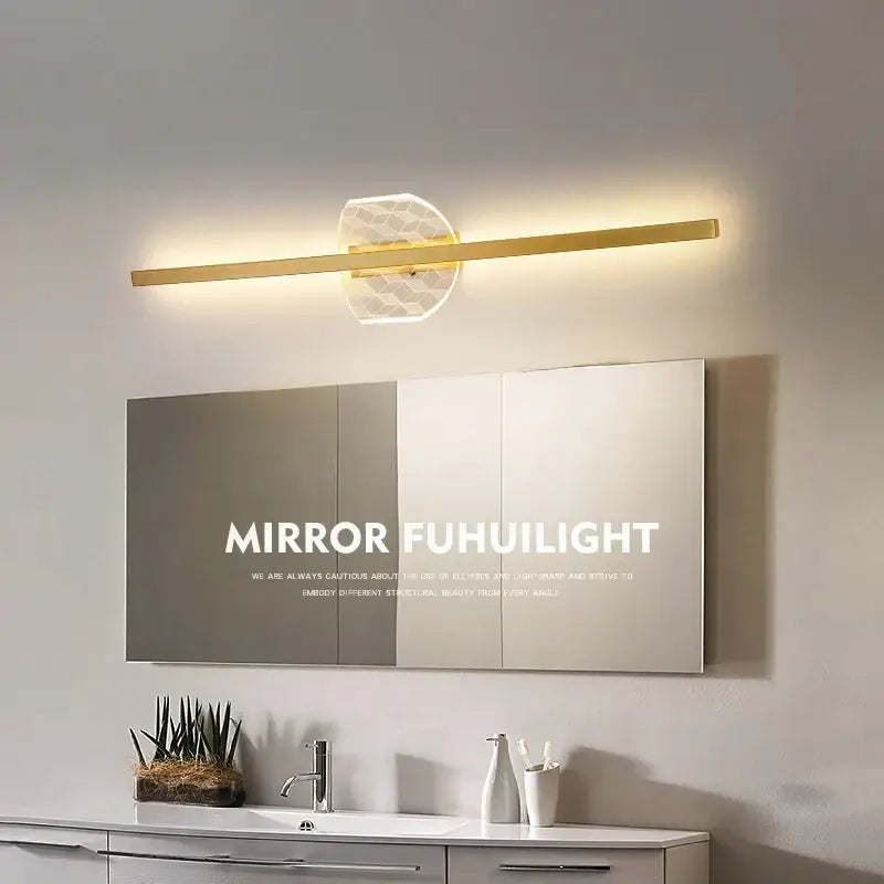 Gold-toned DecorBites led mirror wall lamp with sleek horizontal bar and illuminated textured diffuser for modern decor