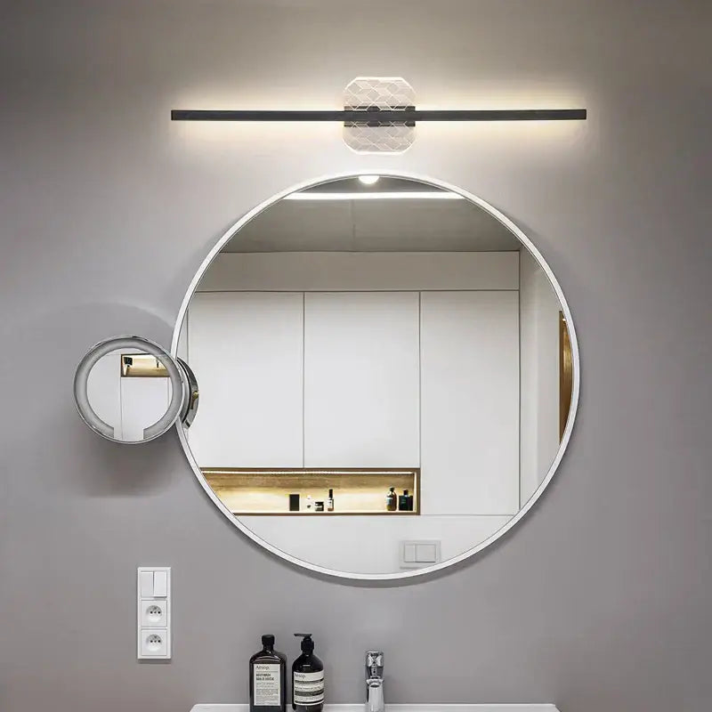 Round white-framed decorbites led mirror wall lamp with built-in magnifying mirror and modern minimalist lighting above