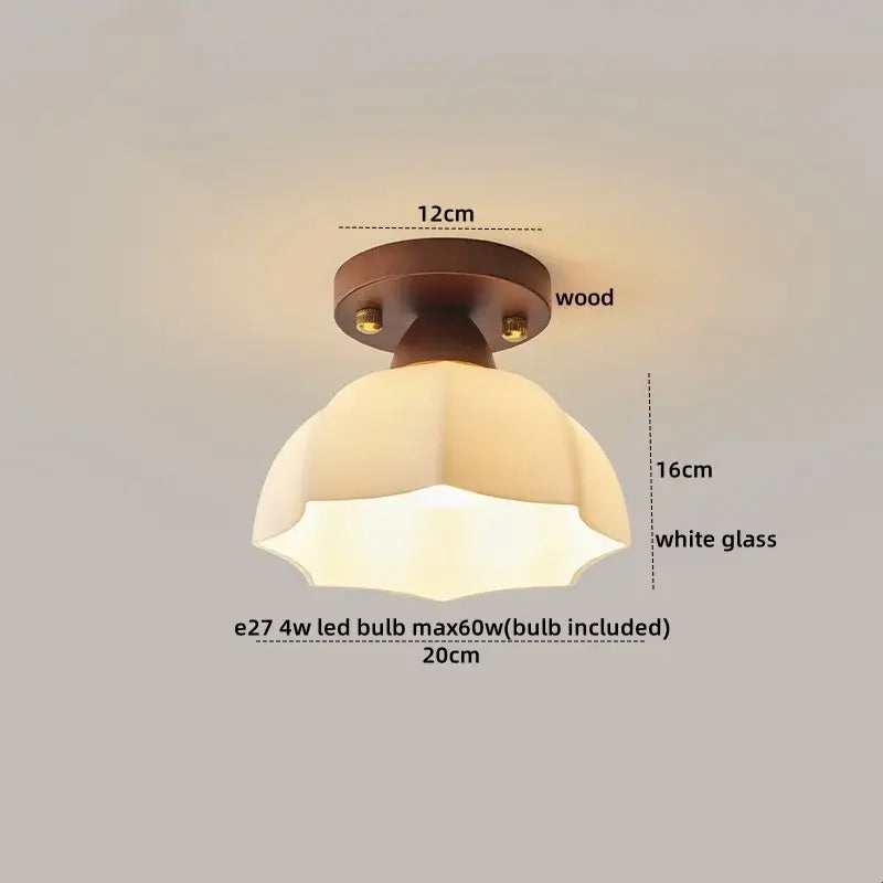 A warm-toned white glass decorbites led modern ceiling light with wooden base and e27 led bulb for indoor use