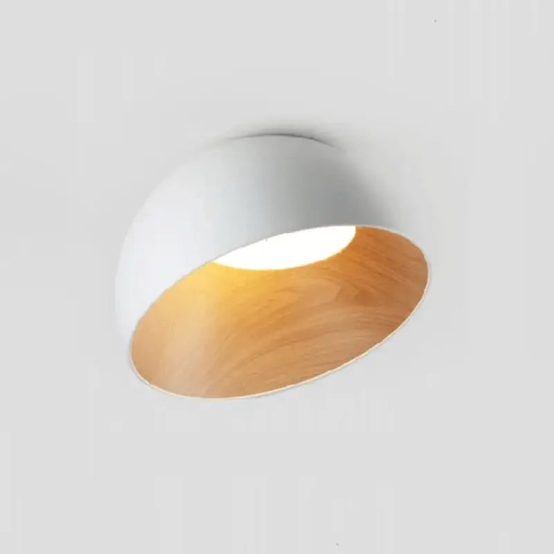 A decorbites led modern recessed ceiling lamp with white exterior and warm wood-toned interior for living spaces