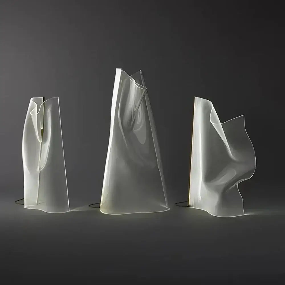 Three translucent decorbites led modern floor lamps with flowing forms and soft white glow for living room decoration