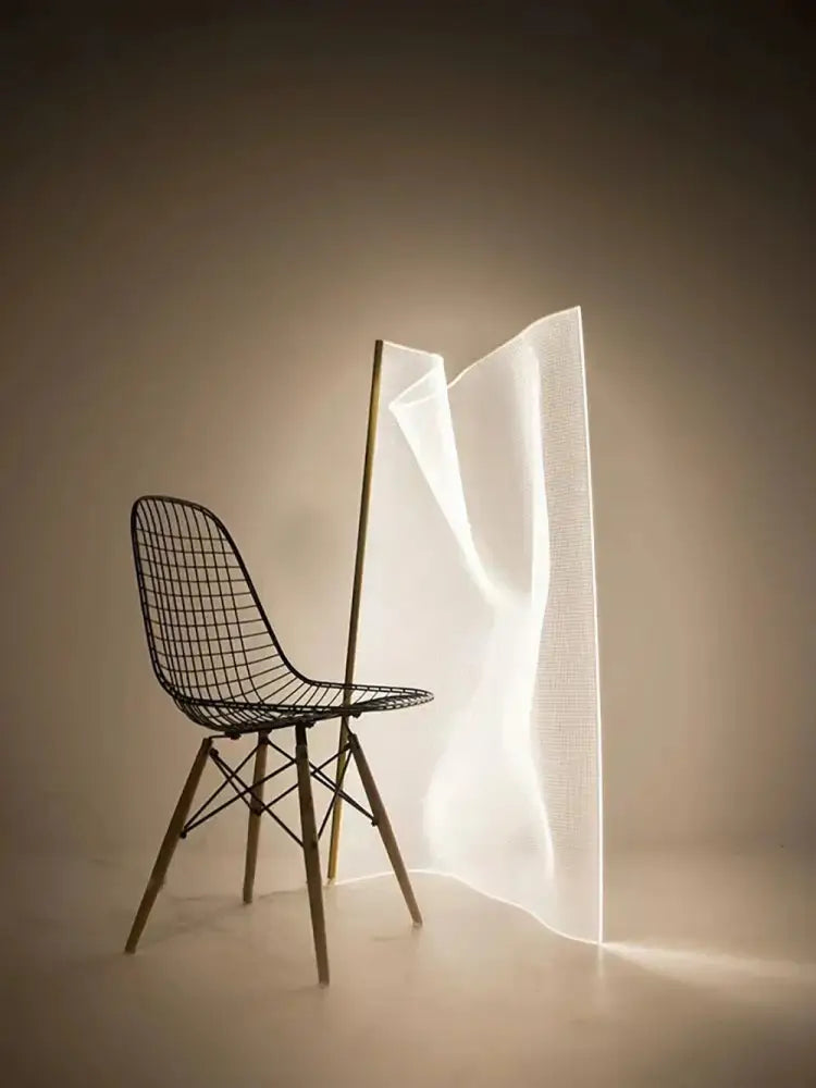 A decorbites led modern floor lamp with a translucent white fabric diffuser and gold-toned metal pole for living room decor