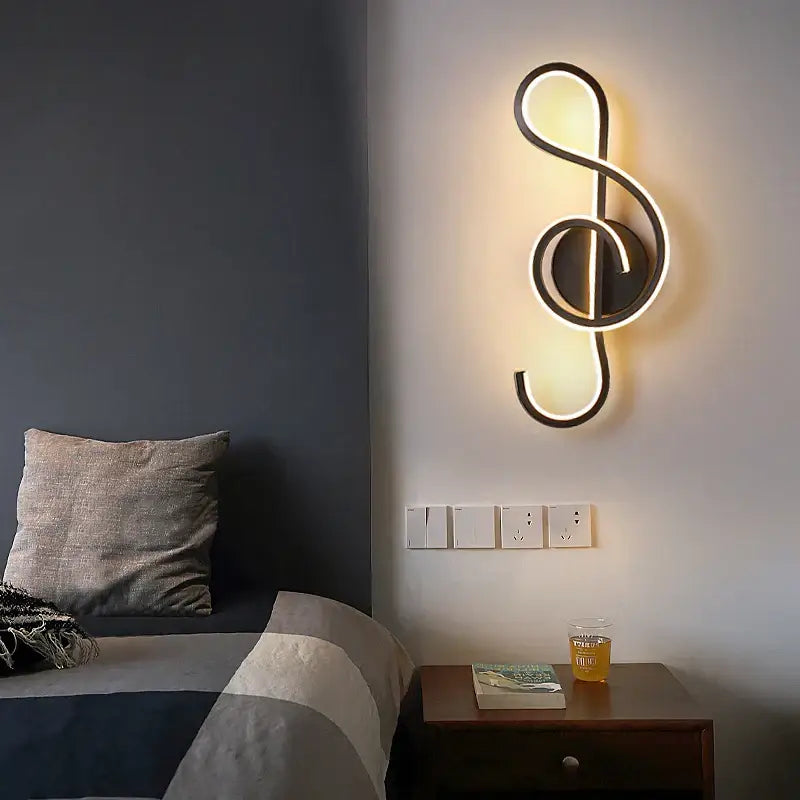 DecorBites LED modern wall lamp shaped like a black treble clef with warm white led illumination for home lighting