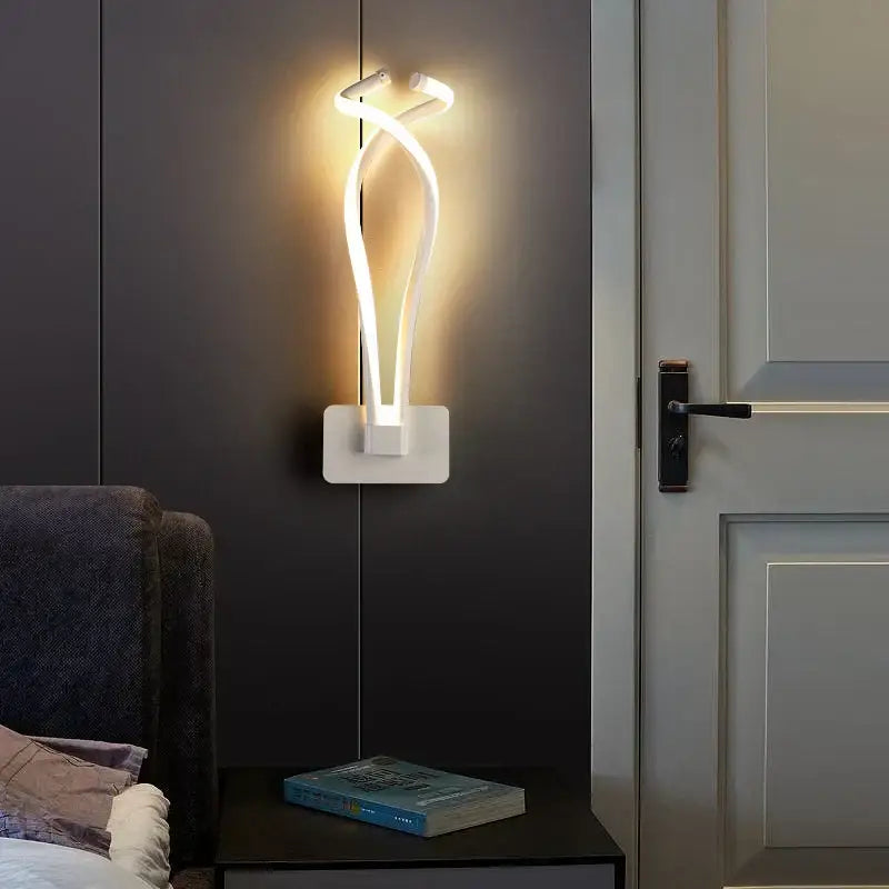Modern white decorbites led modern wall lamp with a sleek twisted design emitting warm light for bedroom and living room lighting